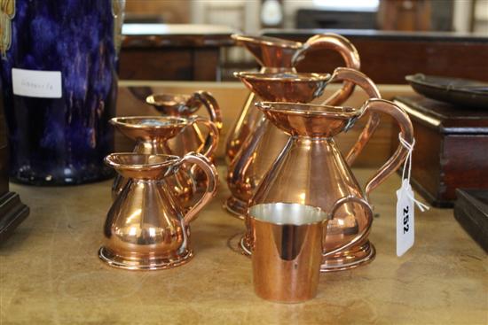 7 copper jugs